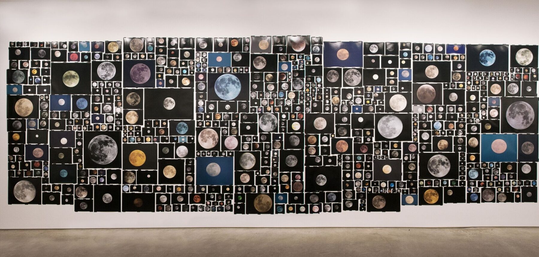 Installation titled Everyone’s Photos Any License by Penelope Umbrico, created 2015–2016. Composed of 654 digital chromogenic prints arranged with variable dimensions, measuring overall 110 by 324 inches. Courtesy of the artist and Bruce Silverstein Gallery.