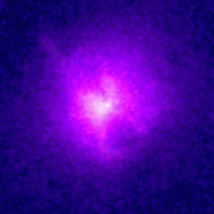 A glowing white orb is seen in a pixelated image surrounded by indigo darkness–presumably the void of outer space. The light or energy emanating from the orb is producing a hot pink or magenta aura of light which fades into a purple and then dissipates into the indigo background.