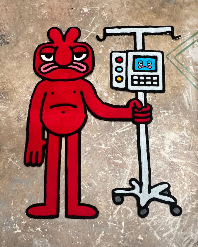 A red cartoon-like drawing of a humanoid figure with a sad face holds an IV pole. The IV pole features a similar sad face on its monitor. The figure and the IV pole are set against a neutral-colored, highly distressed background.
